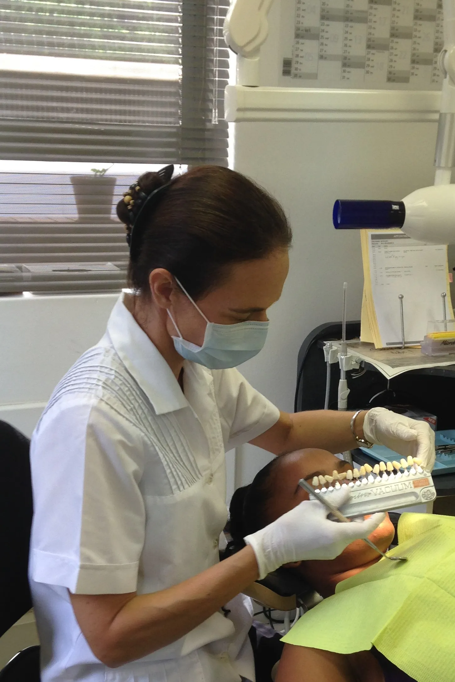 32141 teeth whitening technician working
