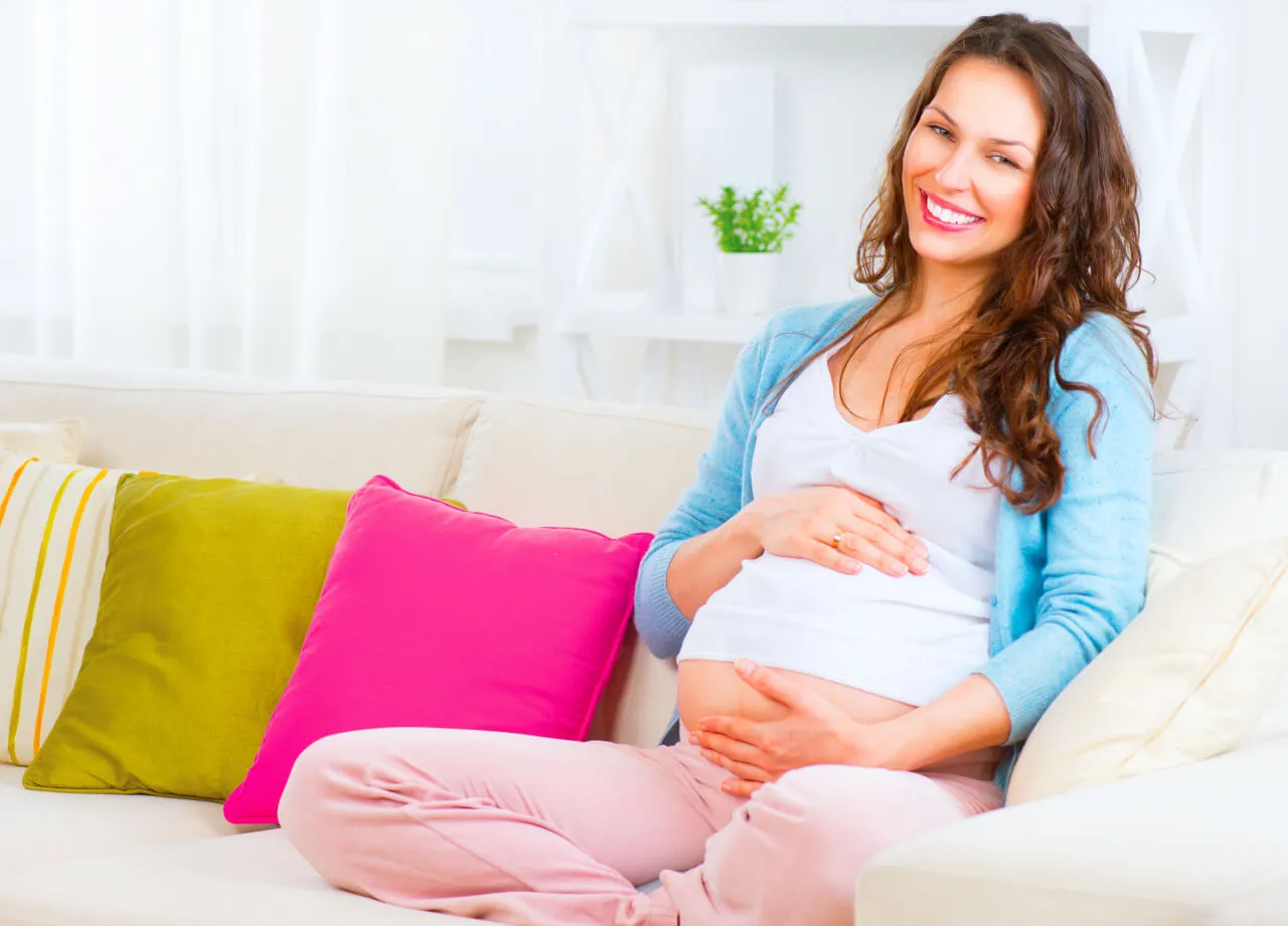 32201 pregnant woman smiling